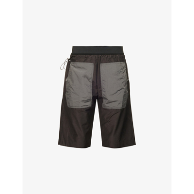 Arnar Mar Jonsson Hraun Contrast-pocket Relaxed Fit Shell Shorts In Black