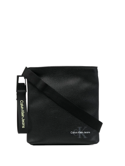 Calvin Klein Tagged Flatpack Cracked Messenger Bag In Black