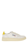 Autry Low-top Leather Sneakers In White/yellow