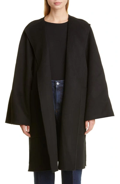 Totême Quilted Long-sleeved Coat In Black