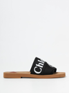 Chloé Woody Flat Logo Ribbon Slide Sandals In Black