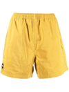 Pleasures Embossed Logo Bermuda Shorts In Yellow