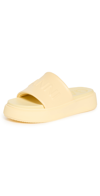 Ganni Yellow Logo Embossed Faux Leather Slides In Pale Banana