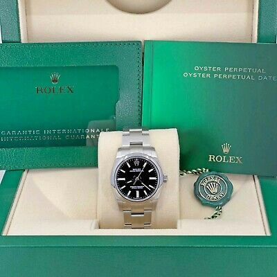 Pre-owned Rolex Ladies Oyster Perpetual 34mm, Black Dial, Ref 124200-0002, Unworn