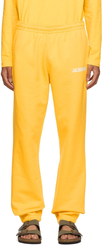 Jacquemus Le Jogging Logo Cotton Jersey Sweatpants In Yellow