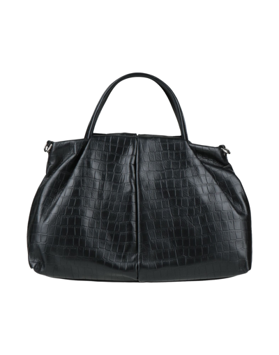 Innue' Handbags In Black