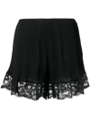 RABANNE LACE-TRIMMED PLEATED SHORTS