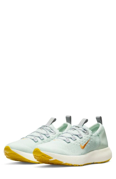 Nike Women's Escape Run Flyknit Road Running Shoes In Barely Green/ Football Grey