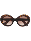 Oliver Peoples Dejeanne Round-frame Sunglasses In Brown