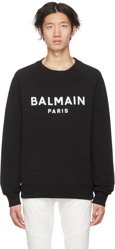 Balmain Logo Flocked Cotton Jersey Sweatshirt In Black