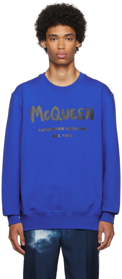 Alexander Mcqueen Graffiti-logo Cotton-jersey Sweatshirt In Blue