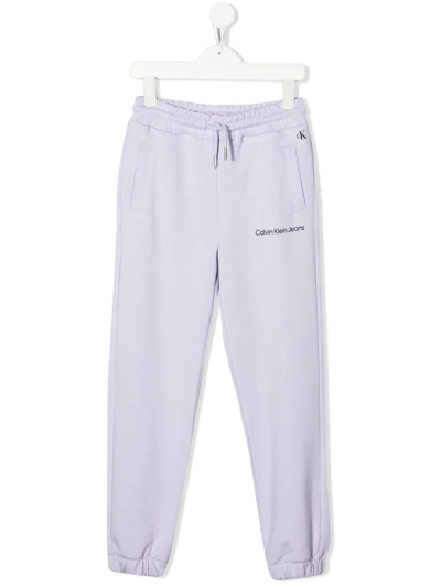 Calvin Klein Logo-print Detail Track Pants In 紫色