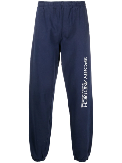 Sporty And Rich Logo-print Detail Track Pants In 蓝色