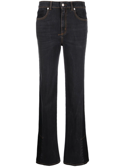 Alexander Mcqueen Logo-patch Bootcut Jeans In Black