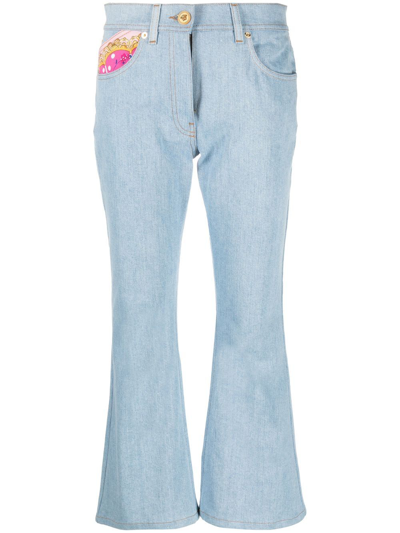 Versace Cropped Printed Twill-paneled Mid-rise Flared Jeans In Light Denim