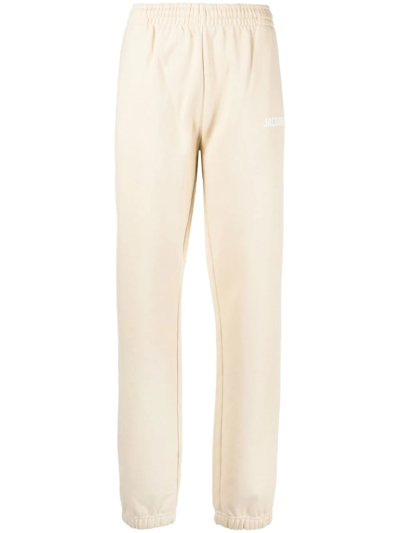 Jacquemus Le Jogging Logo Printed Track Trousers In Neutrals