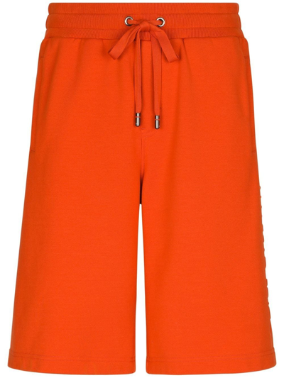 Dolce & Gabbana Embossed-logo Jersey Track Shorts In Orange