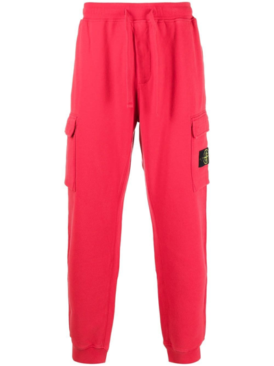 Stone Island Compass-patch Tapered Track Trousers In Red