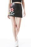 ALICE AND OLIVIA RILEY FLORAL DETAIL FAUX LEATHER SKIRT