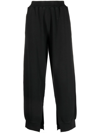 Mm6 Maison Margiela Split-cuff Cotton Track Pants In Black