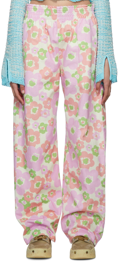 Acne Studios Off-white Flower Print Trousers In Cwr Ecru'/pink