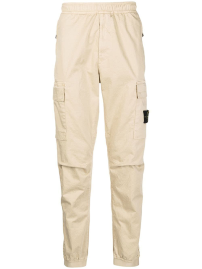 Stone Island Tapered-leg Cargo Trousers In Gelb