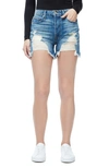 Good American Bombshell Distressed Denim Cutoff Shorts In Blue153