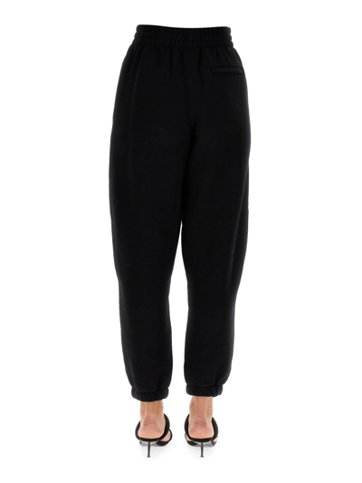 Alexander Wang Embossed Logo Trousers In Black