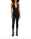 Saint Laurent Plunging Halter Stirrup-hem Jumpsuit In Nero