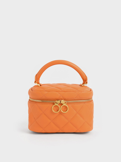 Charles & Keith Quilted Two-way Zip Mini Bag In Orange