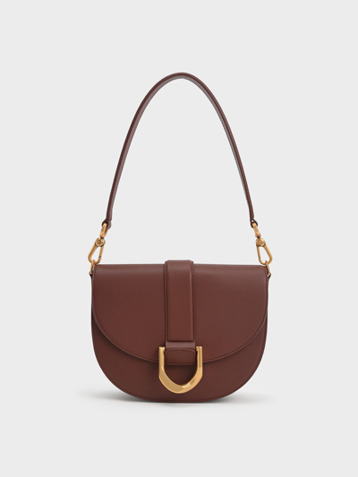 Charles & Keith Gabine Leather Saddle Bag​ In Brown