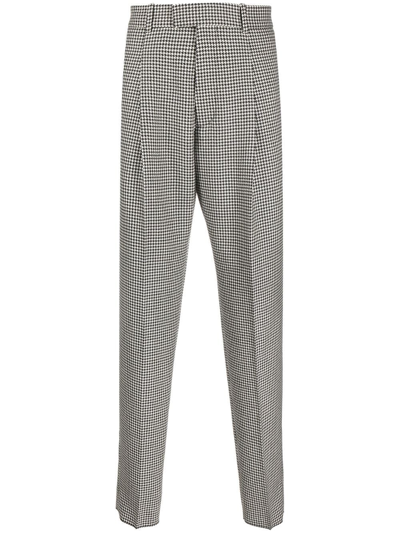 Alexander Mcqueen Tapered Houndstooth Wool Trousers In Ivory/black