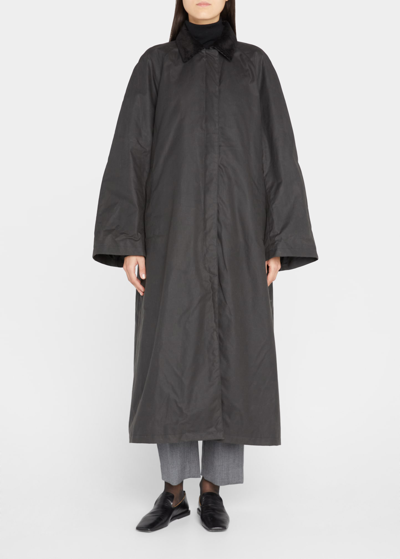 Totême Oversized Wind-resistant Oilcloth Country Coat In 285 Washed Black