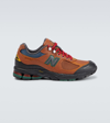 New Balance 2002r Panelled Sneakers In Brown/team Red