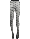 Vetements Semi-sheer Monogram-pattern Stockings In Black