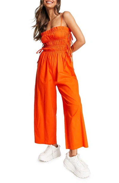 Asos Design Shirred Strappy Jumpsuit With Tie Side Detail In Red