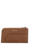Acne Studios Large Garnet Leather Zip Wallet In Brown