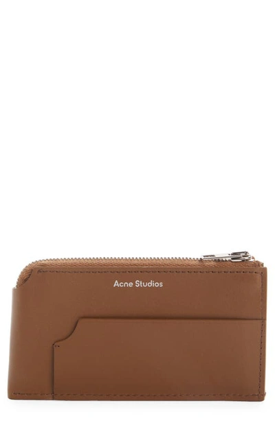 Acne Studios Large Garnet Leather Zip Wallet In Brown