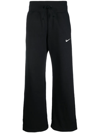 Nike Sportswear Phoenix Embroidered Cotton-blend Jersey Track Pants In Black