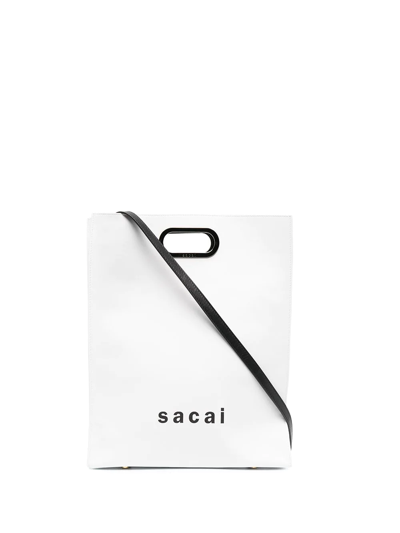 Sacai Logo Print Two-way Bag In White