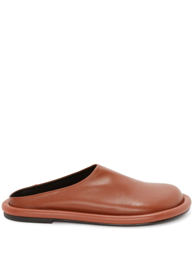 Jw Anderson Bumper-tube Leather Slippers In Brown