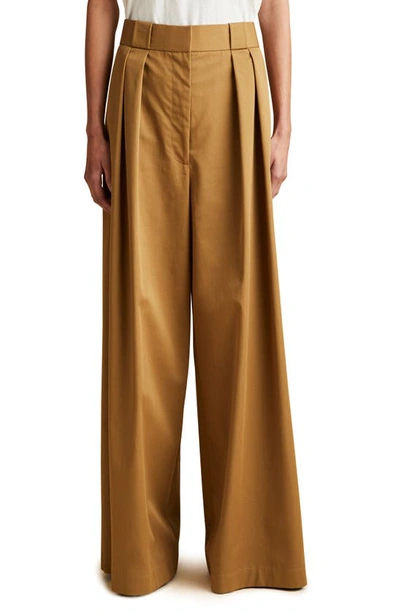 Khaite Rico Pleated Cotton-twill Wide-leg Trousers In Brown