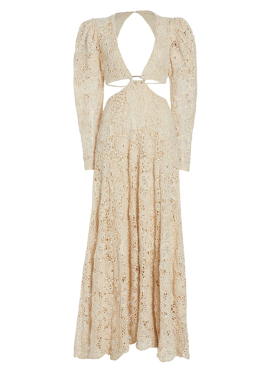 magali pascal lace dress Close up of the Komala Long Dress in Off White. It's a feminine casual dress  with criss cross lace front and contrast topstitch detailing. The tiered  midi dress features wide ruffle flutter