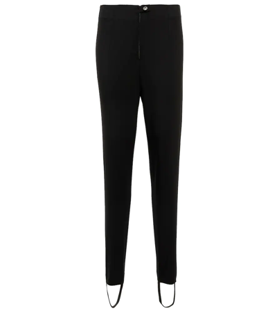 Alaïa High-rise Stirrup Wool Trousers In Noir Alaia