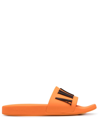 Amiri Logo-embossed Rubber Slides In Orange