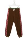 GUCCI BROWN MOTIF TAPE KNITTED TRACK PANTS,694968XWATX18603532