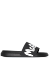 Alexander Mcqueen Graffiti Logo Rubber Slide Sandals In Nero