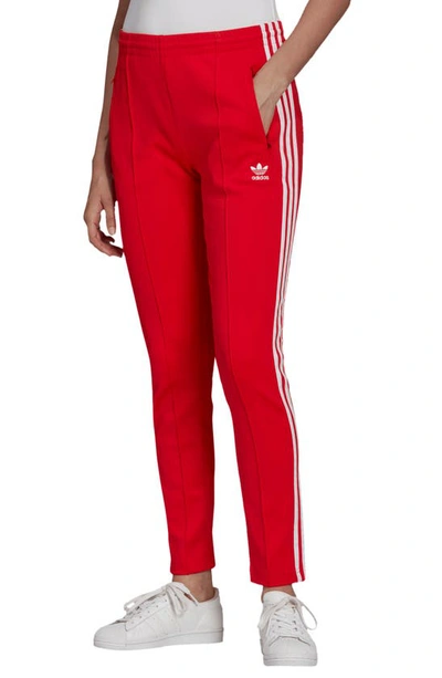 Adidas Originals Primeblue Superstar Track Pants In Better Scarlet/white