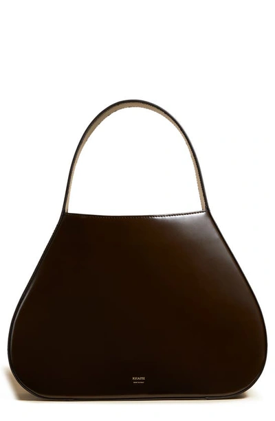 Khaite Small Ada Patent Leather Hobo Bag In Brown