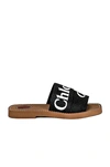 Chloé Woody Flat Logo Ribbon Slide Sandals In Black